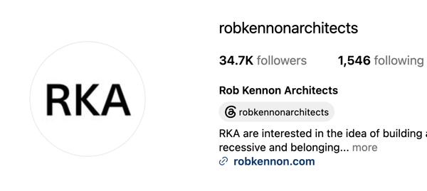 Robb Kenon, an apartment-decor creator, pictured in a warm, carefully styled living space with a relaxed tone.